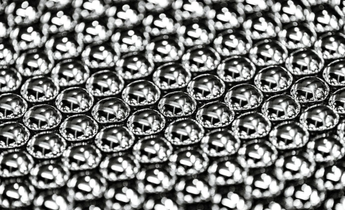 Close-up of a metallic honeycomb pattern